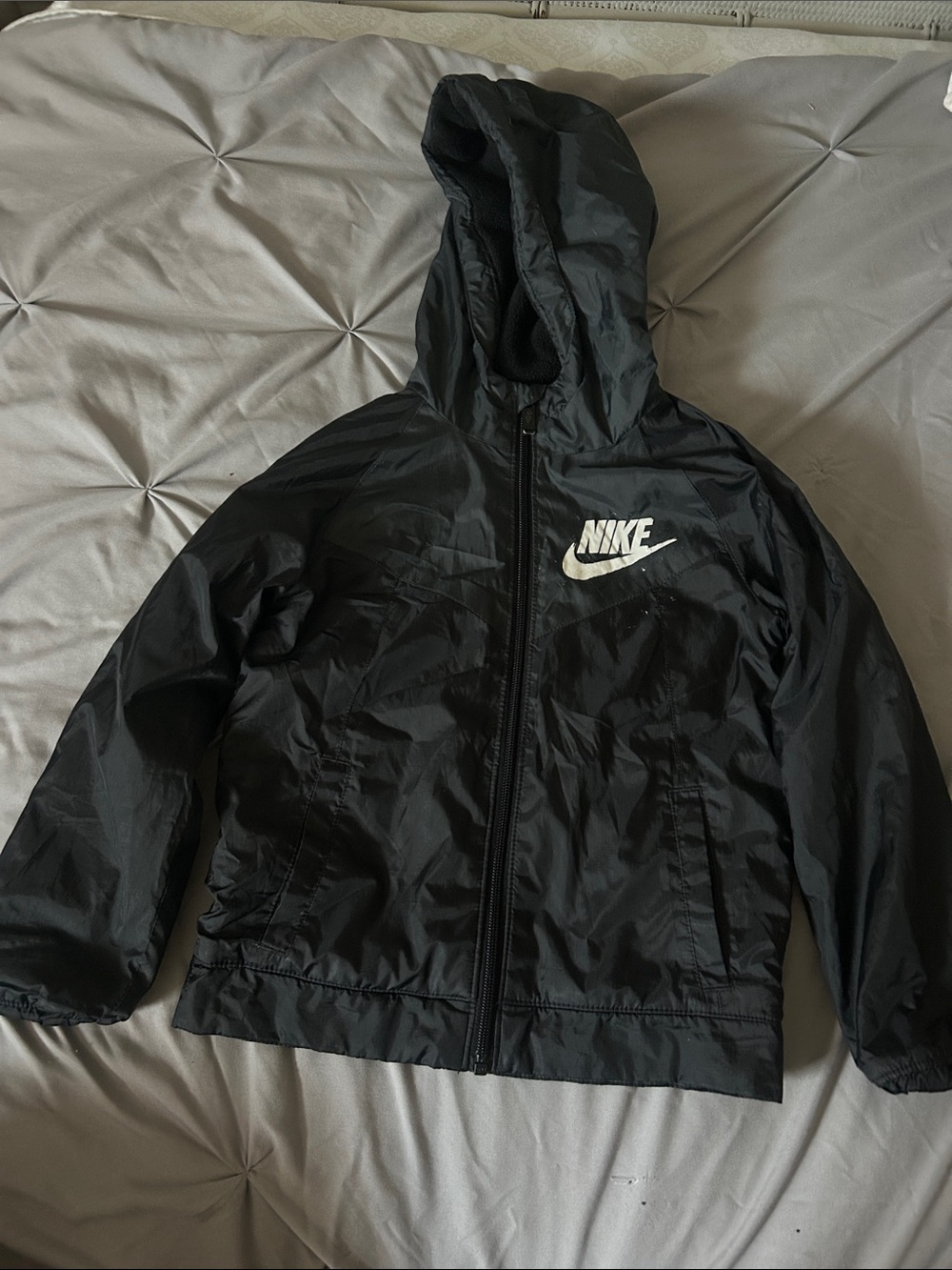 Nike Black Hooded Kids Rain Jacket with White Logo